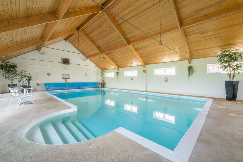 We've rounded up places to stay with both indoor and outdoor pools to dip into