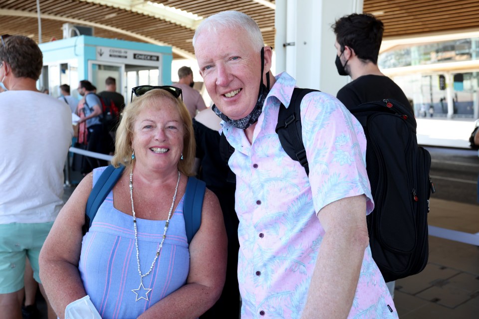 Jim and Elizabeth Muldoon queues at a Covid testing centre at Faro airport yesterday