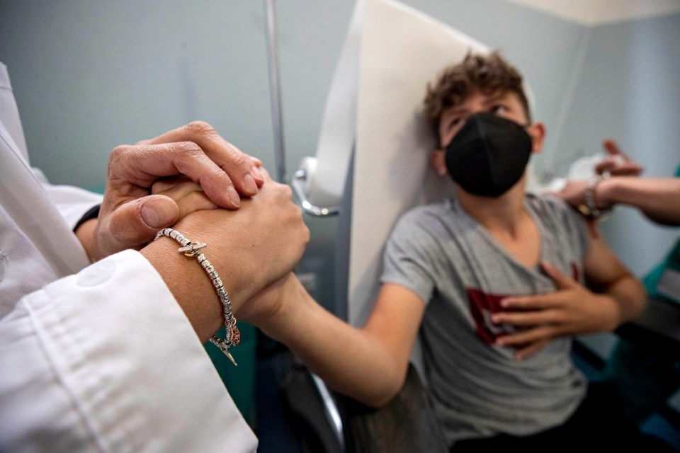 The Italian drugs agency AIFA approved the Pfizer vaccine for youngsters between 12 and 15 years old. Pictured: A boy gets his jab on June 6