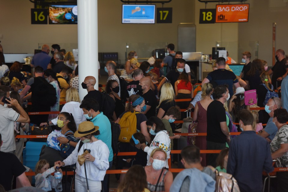 Families crammed into the airport as they caught flights back to the UK today