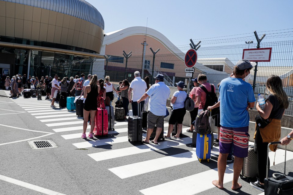 Long queues snaked outside Portugal's Faro Airport today