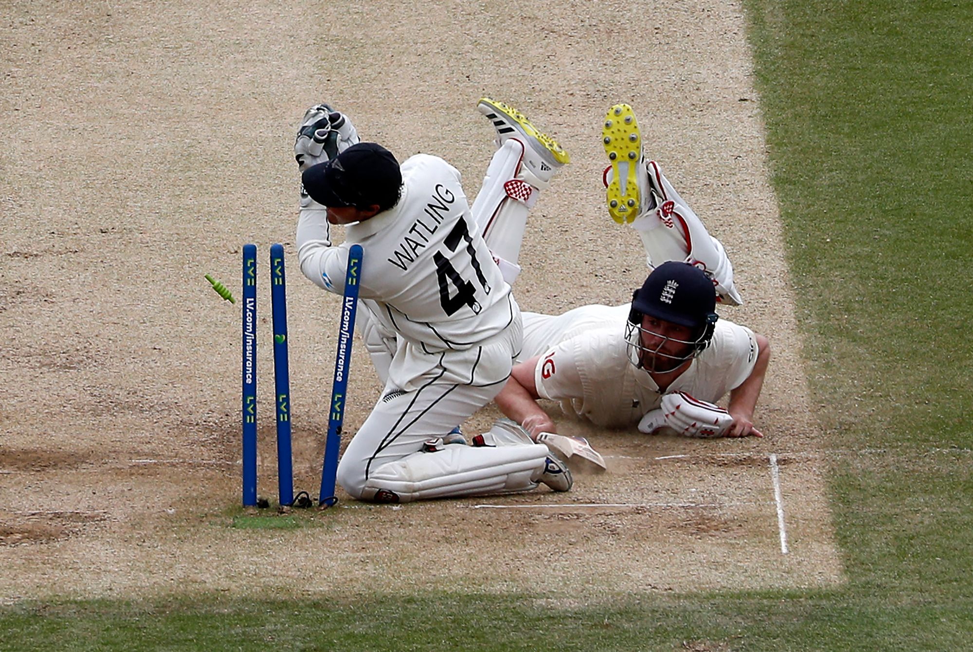 Dom Sibley gets back to his crease as BJ Watling takes off the stumps