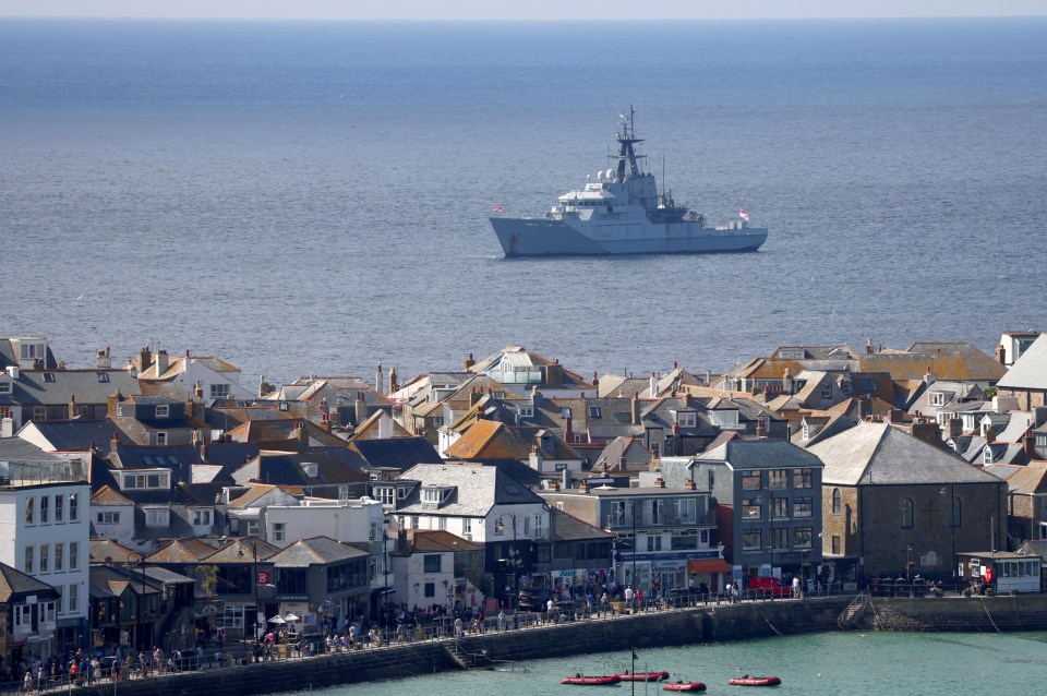 A naval ship is already circulating the village ahead of the summit