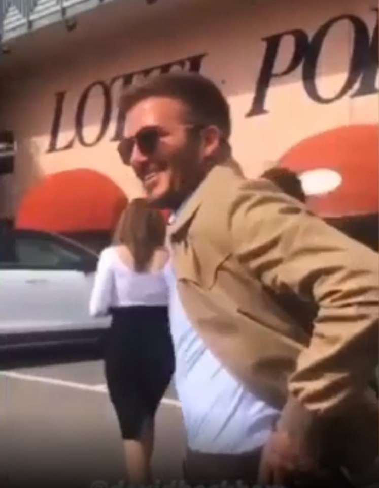 Beckham smiled for pictures with fans at the Riva Ferretti shipyard