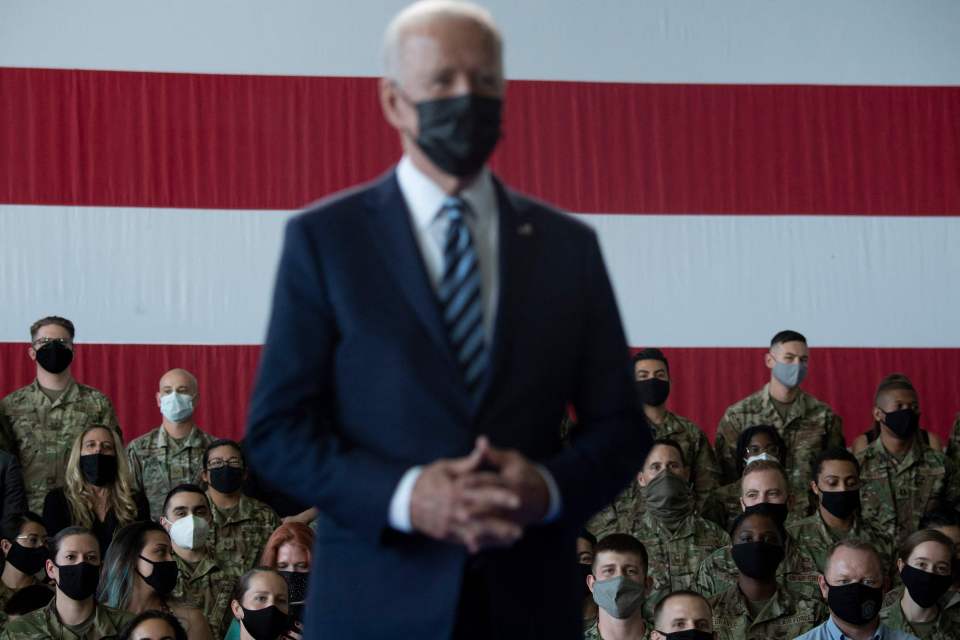 Biden told the crowds to 'be at ease,' before joking that 'I keep forgetting I'm President'