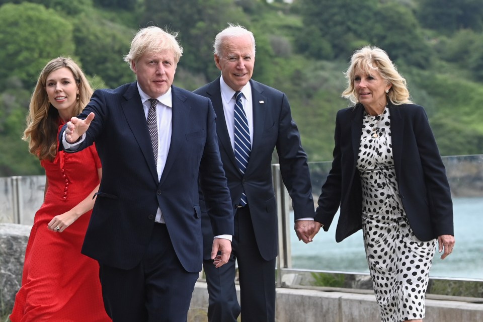 Boris Johnson, his wife Carrie and U.S. President Joe Biden with first lady Jill Biden walk outside Carbis Bay