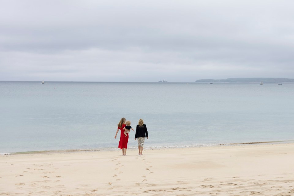 Carrie Symonds, baby Wilfred and Jill Biden went for a walk on the beach in Cornwall