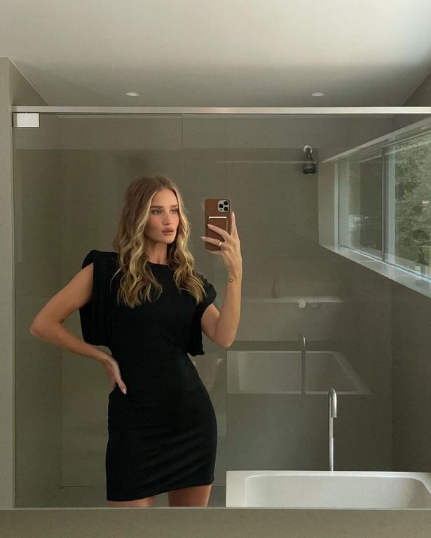 Rosie Huntington-Whiteley poses in her new Chelsea pad