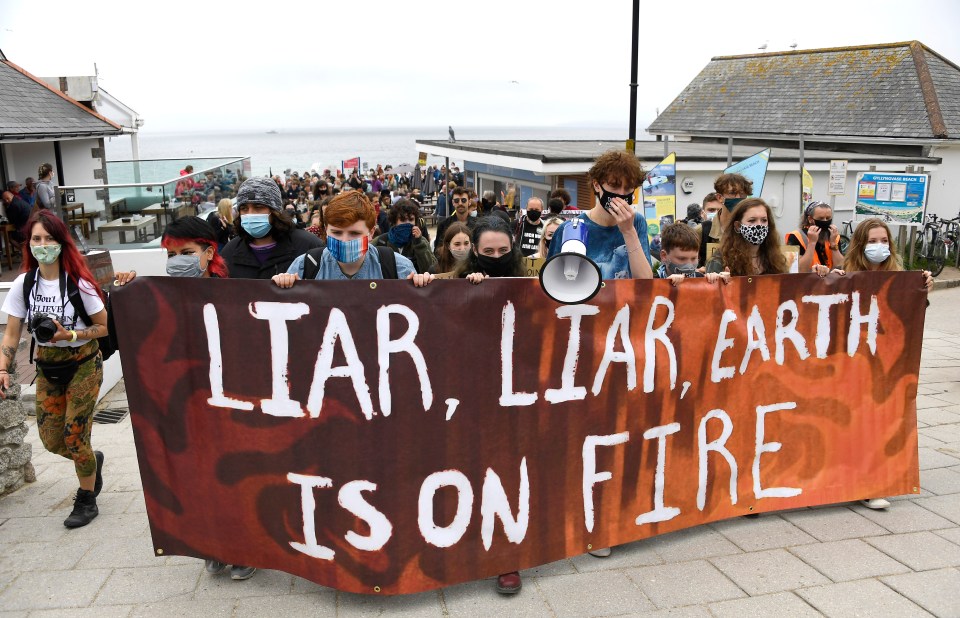 Extinction Rebellion supporters marched through the centre of St Ives