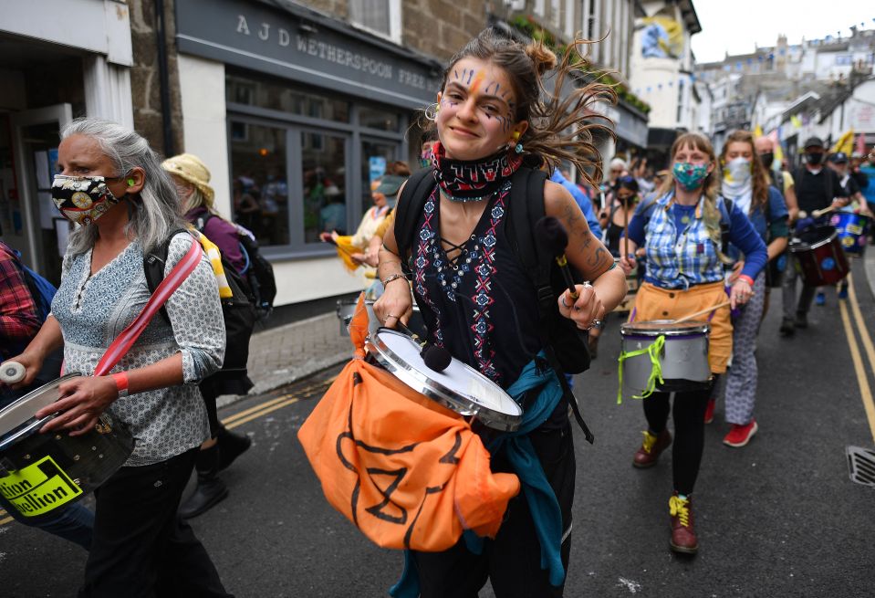 Protestors banged drums as they took to the streets