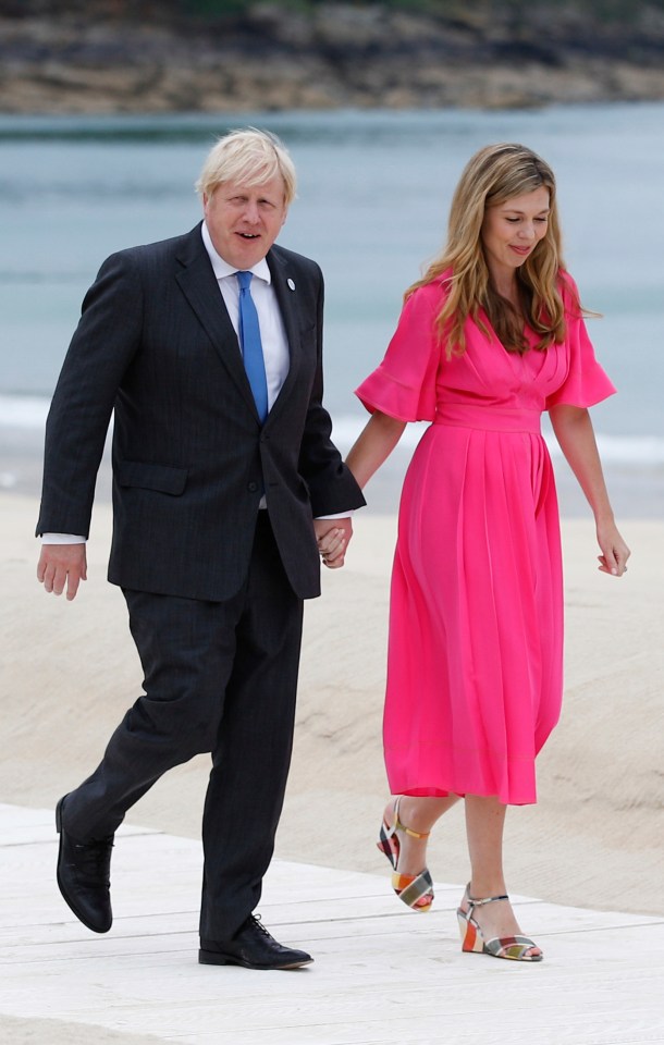 Like Kate and Dr Jill, Carrie had also opted to wear pink, in a rose coloured £1,400 dress by Roksanda