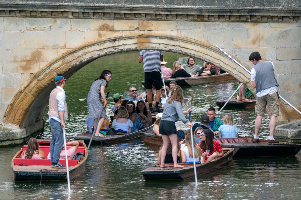 People enjoy punt tours along the River Cam in Cambridge on Saturday