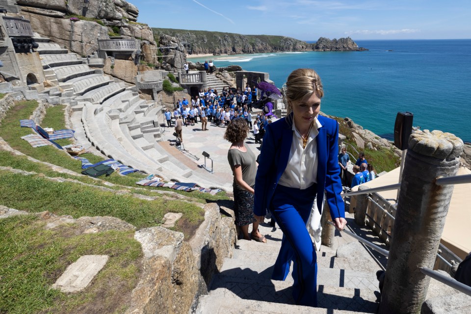 The PM's wife walks up the steep, rocky steps at Minack Theatre, Cornwall