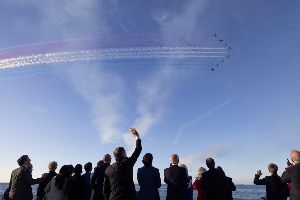 The Red Arrows perform for the group