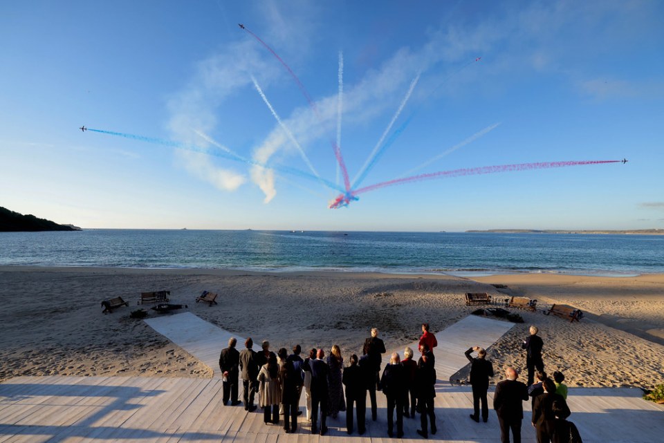 G7 leaders watch the Red Arrows fly past during the G7 Leaders Summit in Carbis Bay, Cornwall