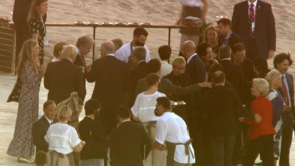 The political leaders enjoying an evening on the beach