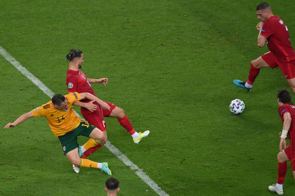 Connor Roberts tucks home Gareth Bale's pull-back in stoppage time to seal an impressive 2-0 win for Wales