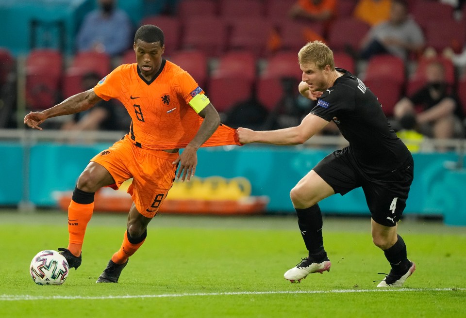 Georginio Wijnaldum is happy to take his Dutch team-mates off the pitch if they suffer racist abuse in Hungary