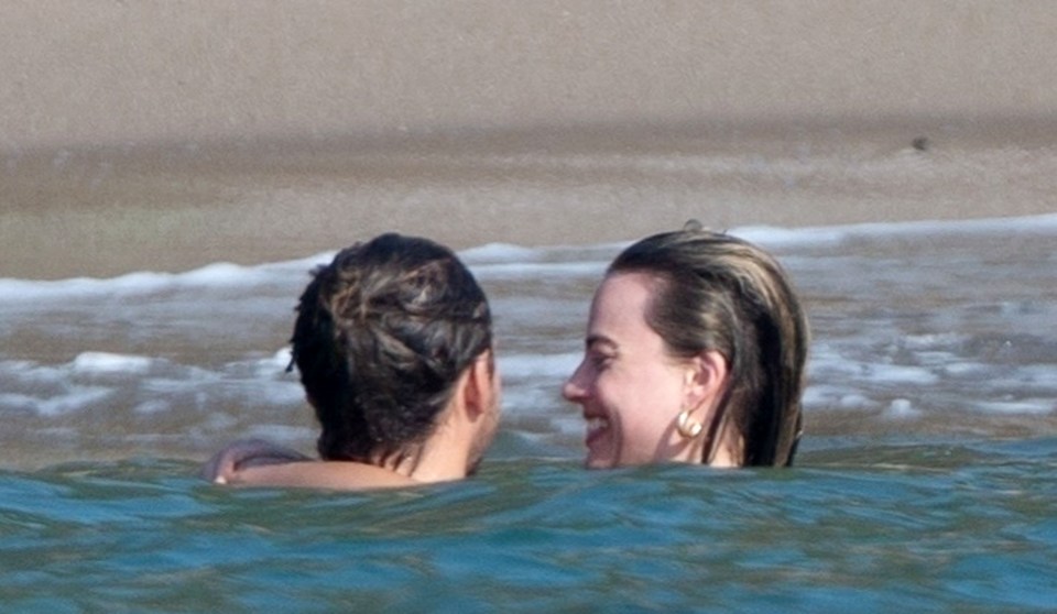 Margot and hubby Tom go for a swim in Mexico