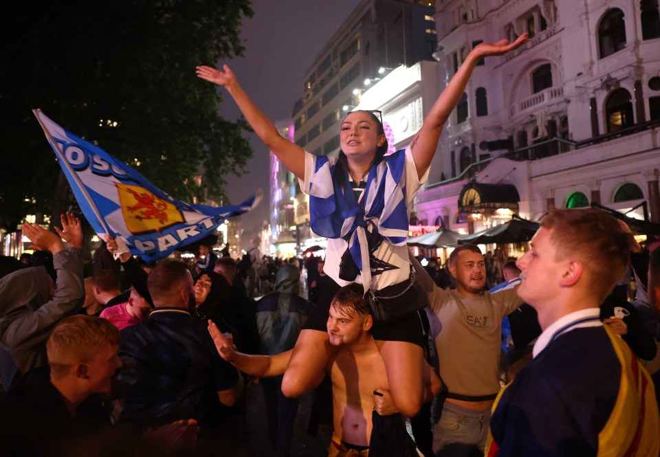 Fans packed Leicester Square - with Scots lighting flares and chanting following their one-point victory