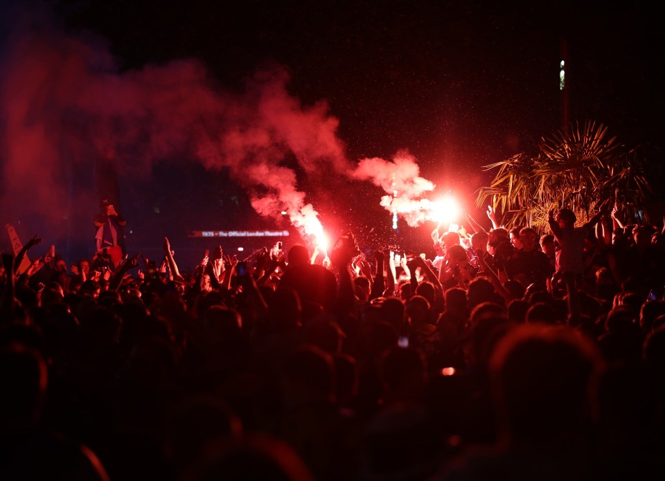 Scots celebrated with flares following the draw