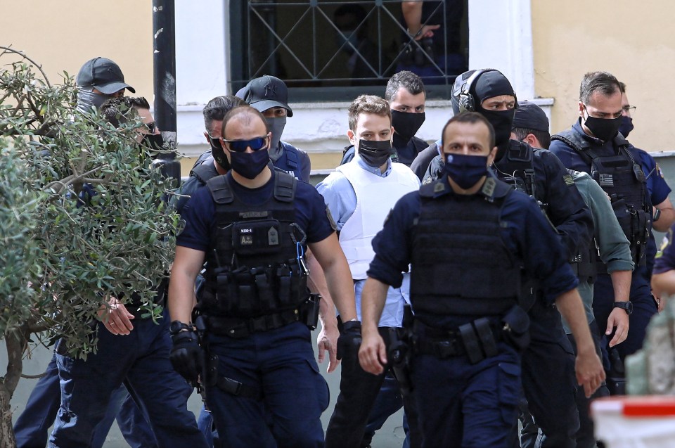 Anti-terror cops guarded Anagnostopoulos as he was led into court