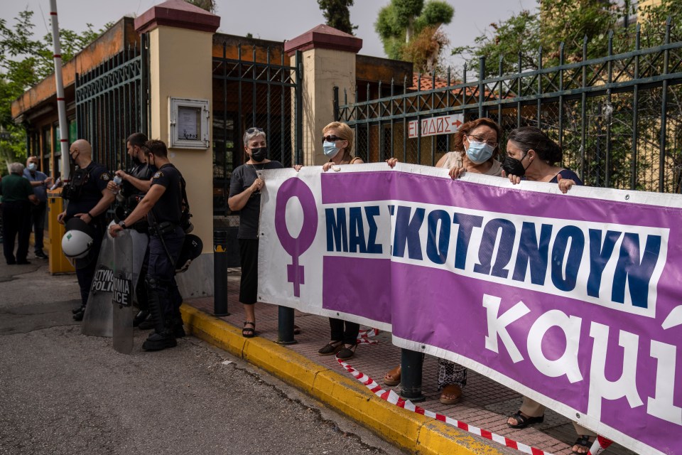 Protesters gathered outside the court in Athens