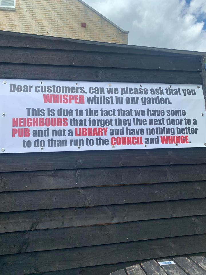 The sign asks customers to whisper to please the neighbours