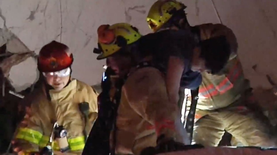 Firefighters rescued a 10-year-old boy from the rubble