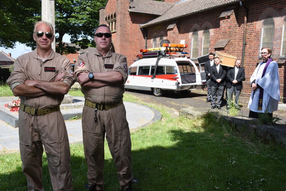 The pair wear costumes like those in the 1984 film with Dan Akroyd and Ernie Hudson