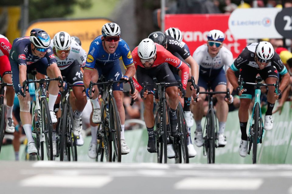 Cavendish out-sprinted Nacer Bouhani, right, and Jasper Philipsen, left for the stage win