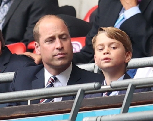 George peers excitedly down at the pitch