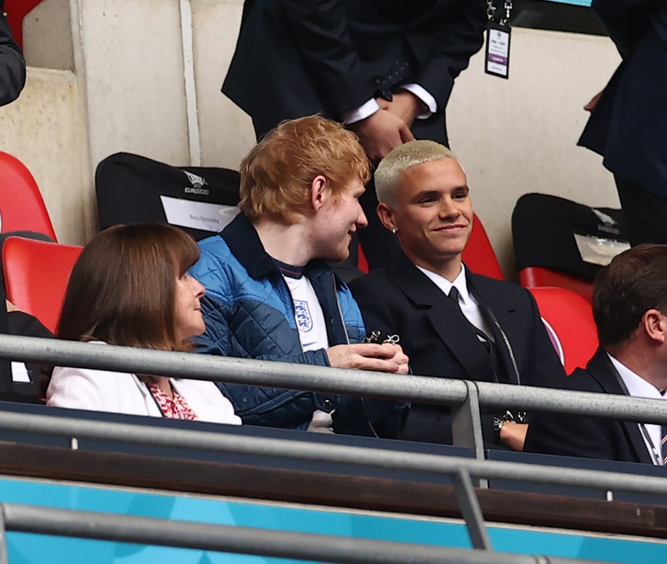 Ed Sheeran is seen joking with Romeo Beckham