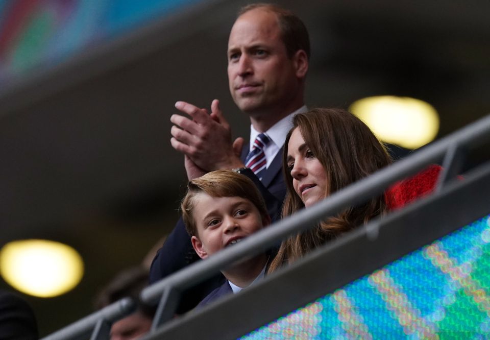 George was all smiles as he watched the game against Germany