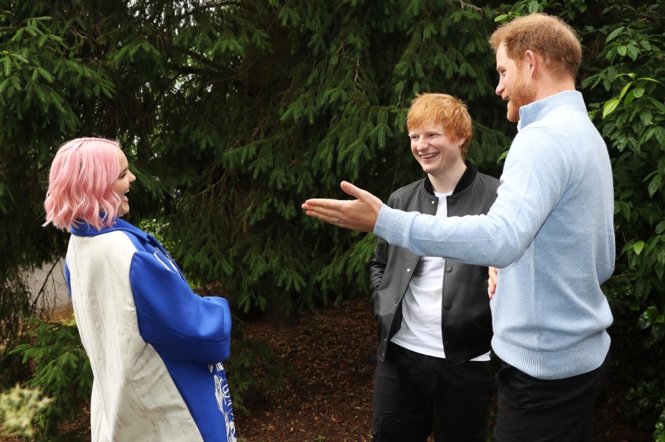 Prince Harry chats with Ed Sheeran and Anne-Marie at the event