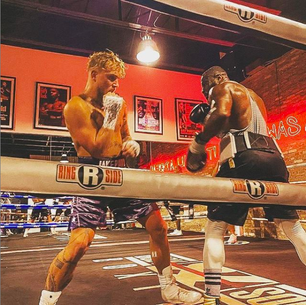 Jake Paul in the ring with Jean Pascal