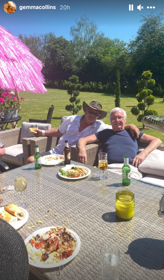 Her dad, right, looked in great health at the family bash