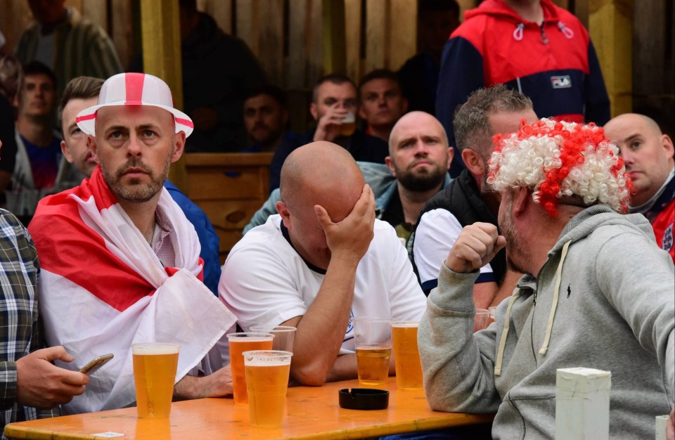 Disappointment on the faces of England supporters in Newcastle's Times Square