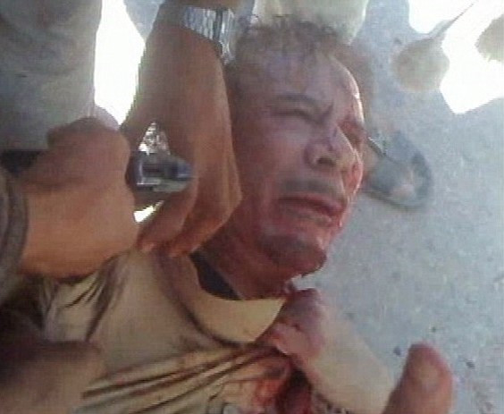 Colonel Gaddafi was brutalised and executed by his own people in 2011 and the images still haunt Putin