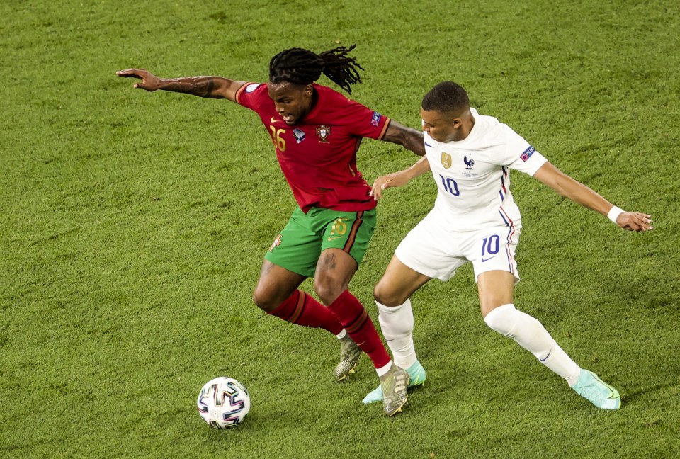 Portugal's No16 tussles with Kylian Mbappe