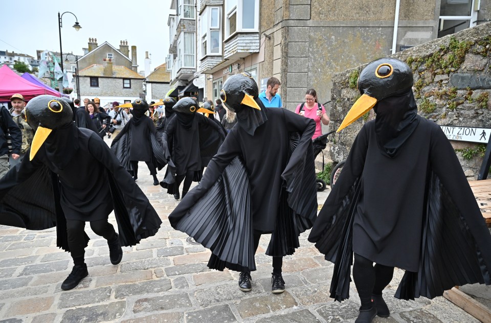 Members of 'Blackbirds XR' got dressed up to stage their protest