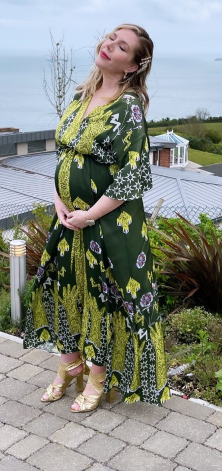 Katherine showed off her bump after keeping it hidden for months