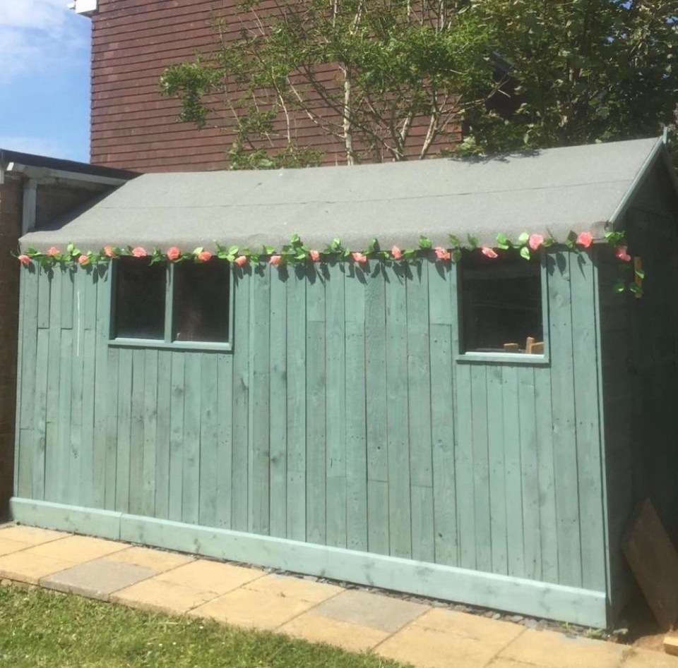 They painted it green and put a flower garland around the roof