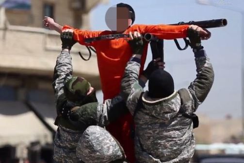 ISIS turned their brutality into propaganda - seen here putting a man on a cross before shooting him dead