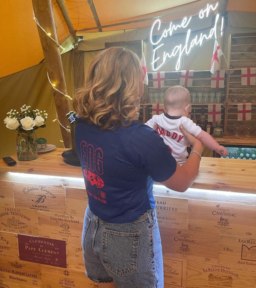 Kane's youngest Louis gets a drink at the bar