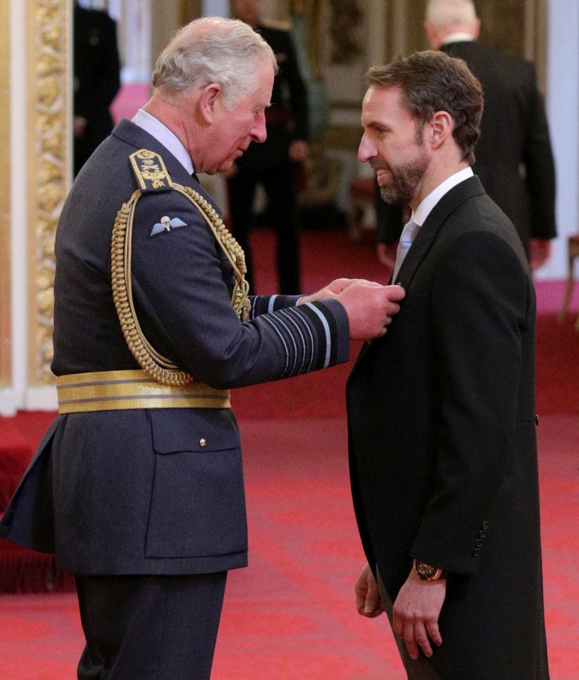 Prince Charles presents Southgate with his OBE