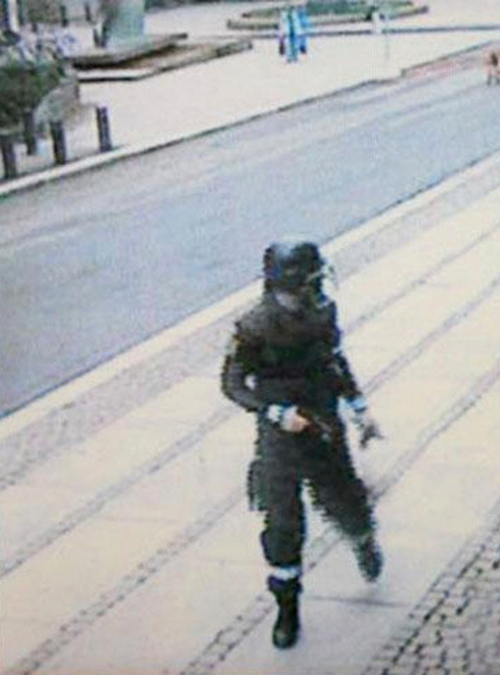 A surveillance camera caught Breivik, dressed in police uniform and carrying a pistol, as he walks away from a car after placing a bomb in Oslo