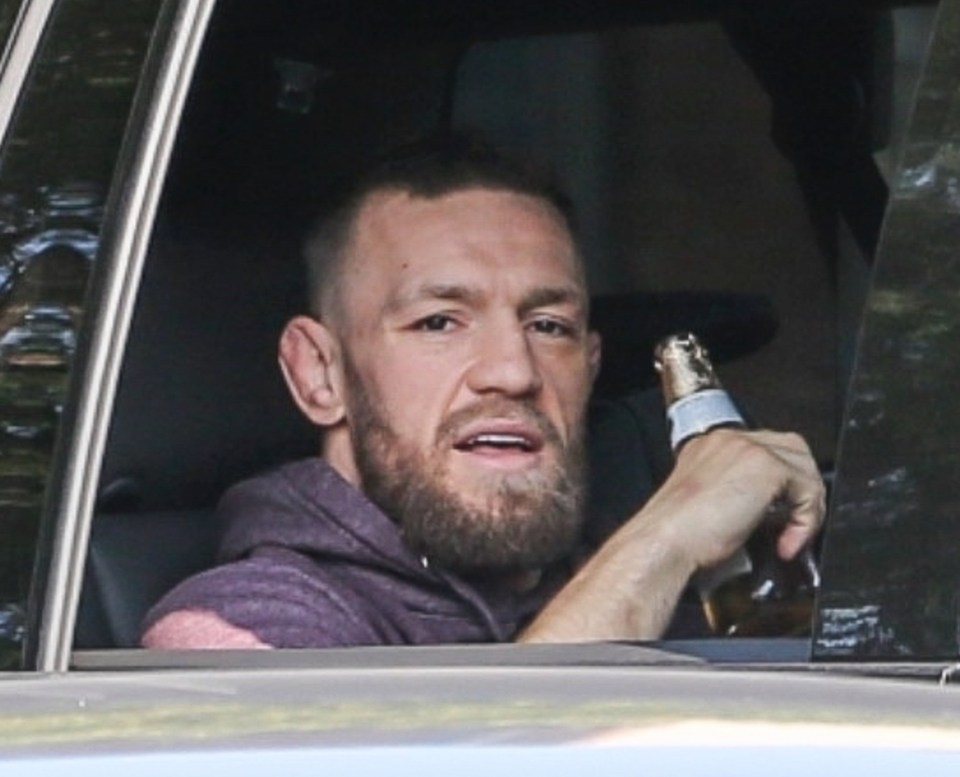 Conor McGregor relaxed in the back of a car in LA