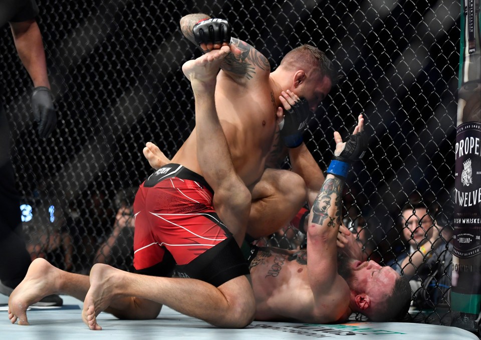 Dustin Poirier ground and pounding Conor McGregor