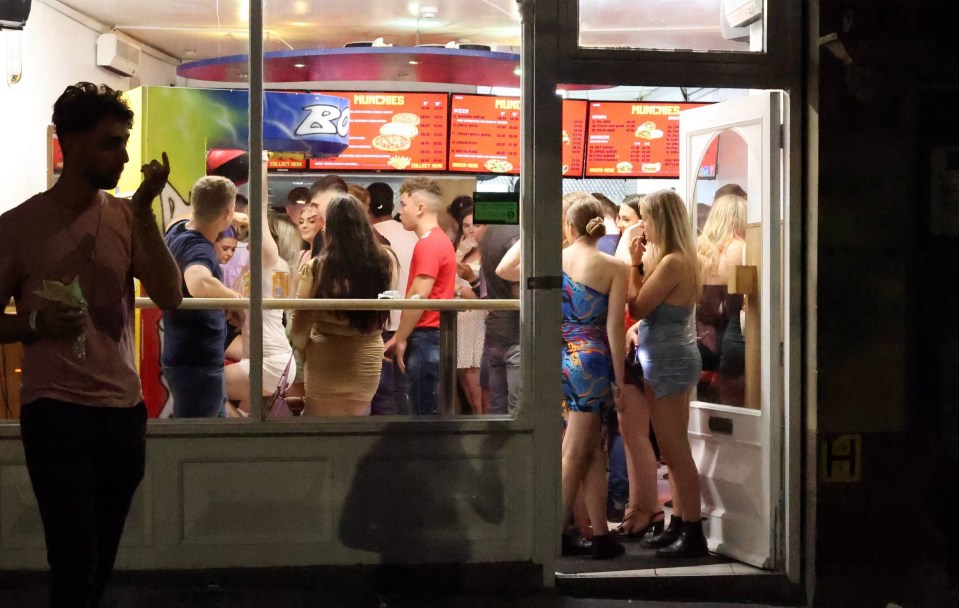 Revellers pack a takeaway